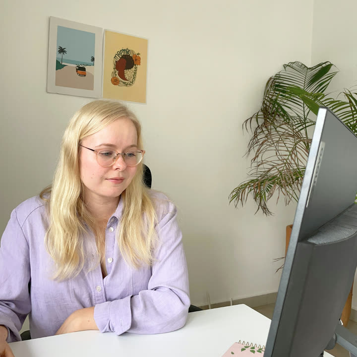 Aino working at her computer